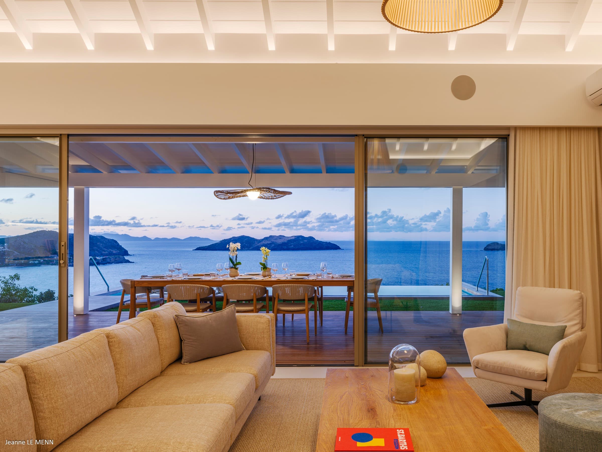 Living room at dusk with warm lighting