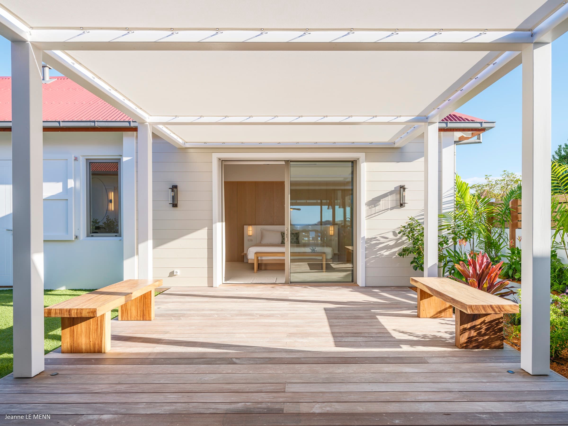 Covered walkway connecting villa spaces